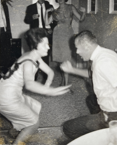 old photo fo man and woman doing the twist dance